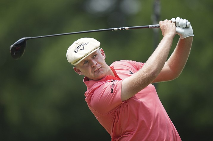 Harry Hall hits a tee shot on the 18th hole during the first round of the Charles Schwab Challenge tournament at the Colonial Country Club in Fort Worth, Texas, Thursday, May 25, 2023. (LM Otero/AP)