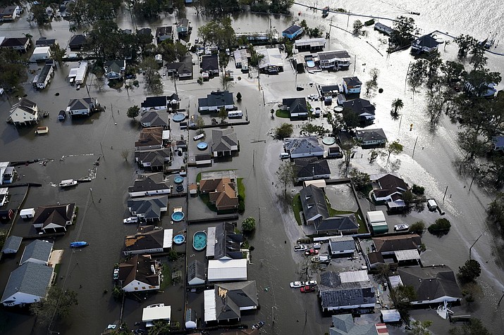 Homes are flooded in the aftermath of Hurricane Ida, Aug. 30, 2021, in Jean Lafitte, La. National Oceanic and Atmospheric Administration on Thursday, May 25, 2023, announced its forecast for the 2023 hurricane season. (David J. Phillip/AP, File)