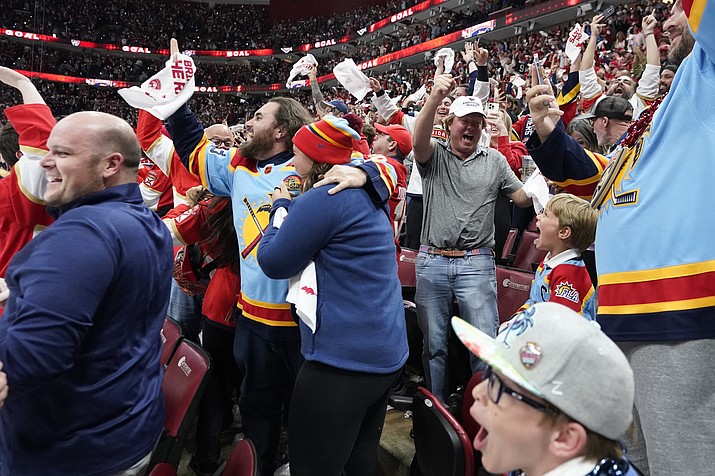 Fans react after Florida Panthers left wing Matthew Tkachuk scored a power-play goal with 4.9 seconds left in the third period of Game 4 of the Stanley Cup Eastern Conference finals against the Carolina Hurricanes, Wednesday, May 24, 2023, in Sunrise, Fla. (Wilfredo Lee/AP)