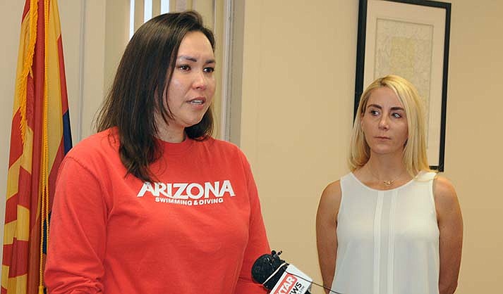Former University of Arizona swimming star Marshi Smith explains Wednesday why she supports a new state law that bars transgender girls from competing in girls' sports. With her is Phoenix resident Shawna Glazier, a competitive cyclist who said she was defeated in a race by a male who identified as a woman. (Capitol Media Services photo by Howard Fischer)