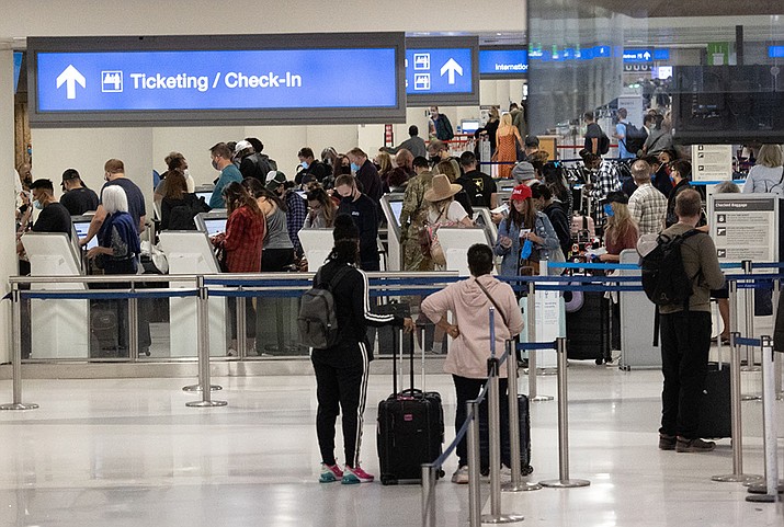 Analysts expect near-record crowds at Phoenix Sky Harbor International Airport this Memorial Day weekend. But economists say tourism would be hit hard if the U.S. defaults on its debts next week, which would be bad news for tourism-dependent states like Arizona. (Kasey Brammell/Cronkite News file)