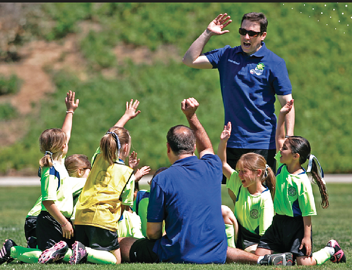 Head coach talking to his team after a game. (Courtesy/Aaron Walksler)