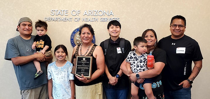Rose Blackhorse-Gill poses with family members after receiving the Emergency Medical Care Technician award from the Arizona Department of Health Services. (Submitted photo)
