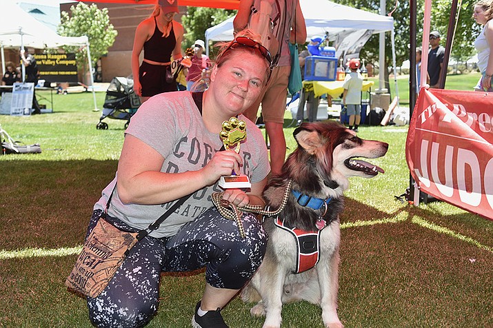 Second place winner of the Best Trick or Talent contest, Siku with owner Christina Branscum at WOOFstock at Prescott Valley Civic Center on Saturday, June 11, 2022. (Jesse Bertel/Courier, file)