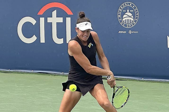 Jennifer Brady of the United States hits a backhand against Anhelina Kalinina of Ukraine in their first-round match at the DC Open, Tuesday, Aug. 1, 2023, in Washington. Brady won her first WTA Tour match in two years on Tuesday, overwhelming 28th-ranked Anhelina Kalininia 6-2, 6-1 in a little over an hour at the DC Open. (Howard Fendrich/AP)