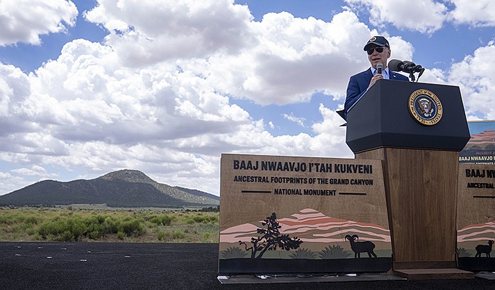 President Joe Biden speaks before signing a proclamation designating the Baaj Nwaavjo I'Tah Kukveni National Monument at the Red Butte Airfield Tuesday, Aug. 8, 2023, in Tusayan. (AP Photo/Alex Brandon)