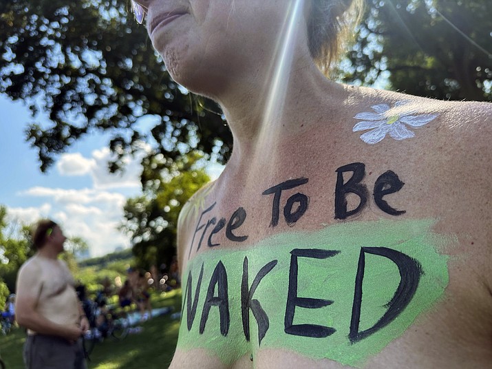 A rider poses at the start of the Philly Naked Bike Ride in Philadelphia, Saturday, Aug. 26, 2023. (Tassanee Vejpongsa/AP)