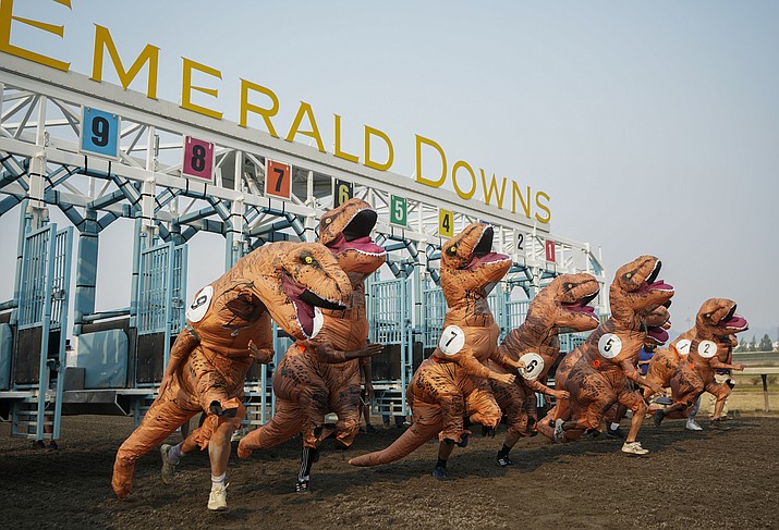 Racers, including eventual winner Ocean Kim (5), leave the gates for the championship race during the “T-Rex World Championship Races” at Emerald Downs, Sunday, Aug. 20, 2023, in Auburn, Wash. (Lindsey Wasson/AP)