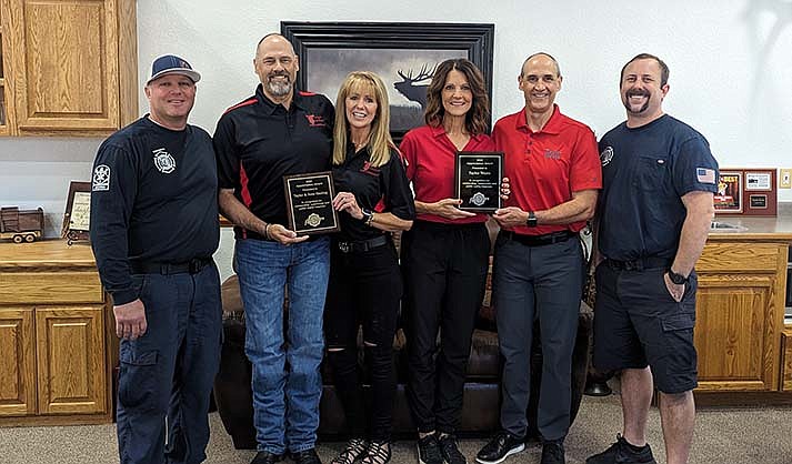 Cottonwood Firefighters Association presents an Appreciation Award to Chris & Tandy Taylor (Taylor Waste) & Scott & Natalie Taylor (Taylor & Sons Hauling).