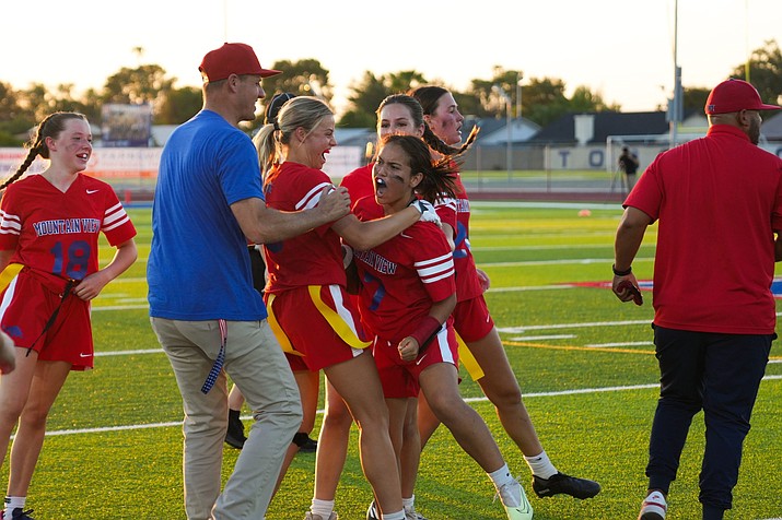 Flag football made its debut as an AIA-sanctioned sport Tuesday. Among the 57 schools in Arizona to offer it is Mountain View High School, which celebrated its win against Mountain Pointe. (William Wilson/Cronkite News)