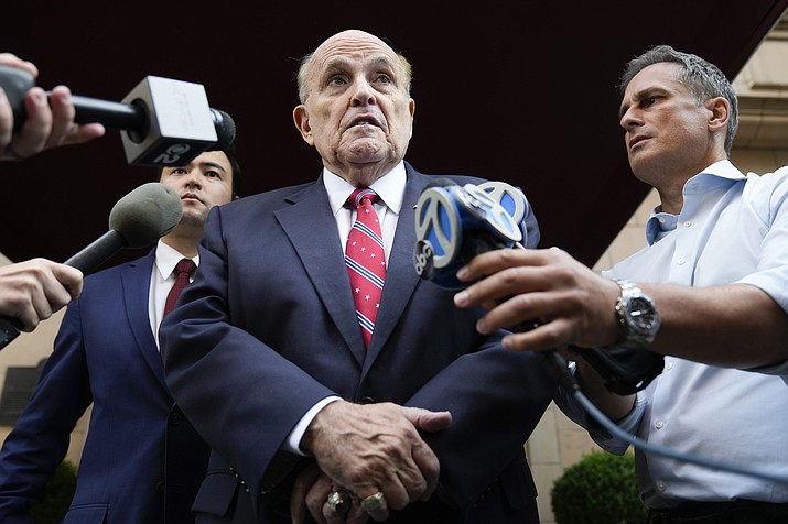 Former Mayor of New York Rudy Giuliani speaks to reporters as he leaves his apartment building in New York, Wednesday, Aug. 23, 2023. Giuliani on Friday, Sept. 1, pleaded not guilty to Georgia charges that accuse him of trying, along with former President Donald Trump and others, to illegally overturn the results of the 2020 election in the state. (Seth Wenig/AP, File)