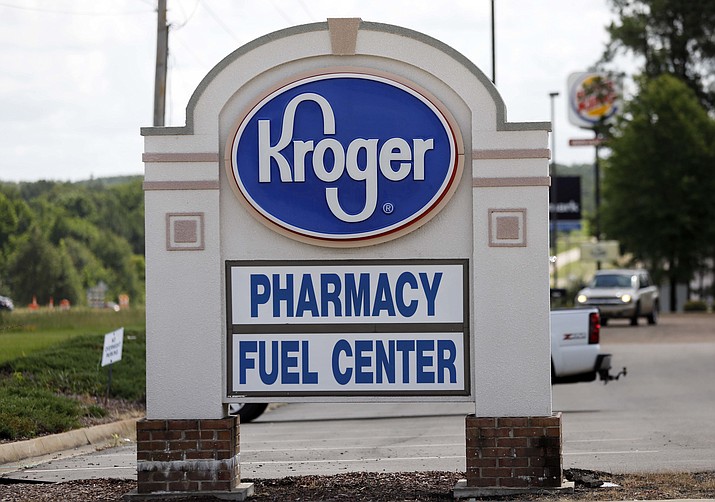 A Kroger grocery store sign promotes its pharmacy and fuel center at its Flowood, Miss., location, Thursday, June 15 2017.  Kroger on Friday, Sept. 8, 2023, announced an agreement to pay up to $1.4 billion to settle lawsuits that claimed the company contributed to the U.S. opioid crisis. (Rogelio V. Solis/AP, File)