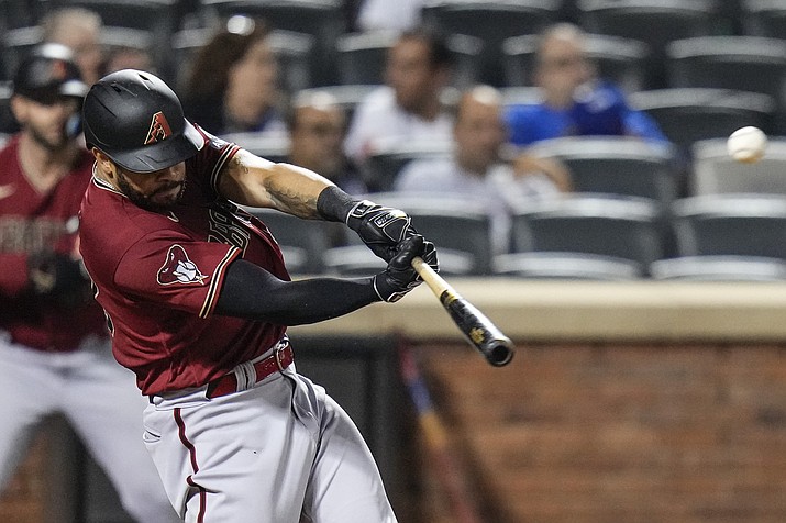 Arizona Diamondbacks' Tommy Pham hits a home run during the eighth inning of a game against the New York Mets, Monday, Sept. 11, 2023, in New York. (Frank Franklin II/AP)