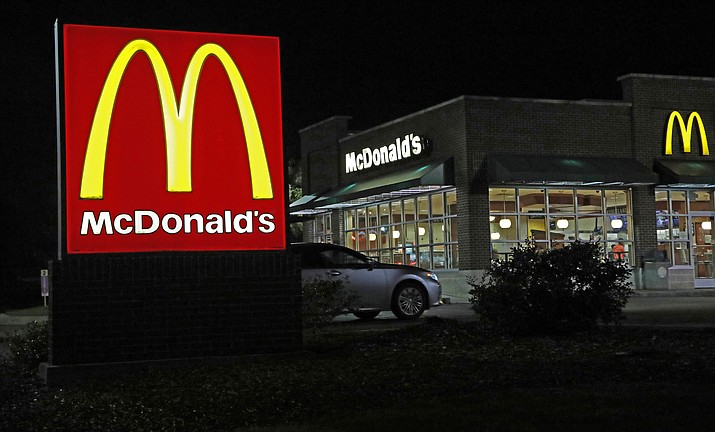 A McDonald's restaurant is seen, Feb. 14, 2018, in Ridgeland, Miss. McDonald's plans to eliminate self-service soda machines at all of its U.S. restaurants by 2032, the Chicago-based fast food chain has confirmed. In an email to The Associated Press on Tuesday, Sept. 12, 2023, McDonald's USA said the goal of the change is to create consistency for customers and crew members across the chain's offerings — from in-person dining to online delivery and drive-thru options. (Rogelio V. Solis/AP, File)