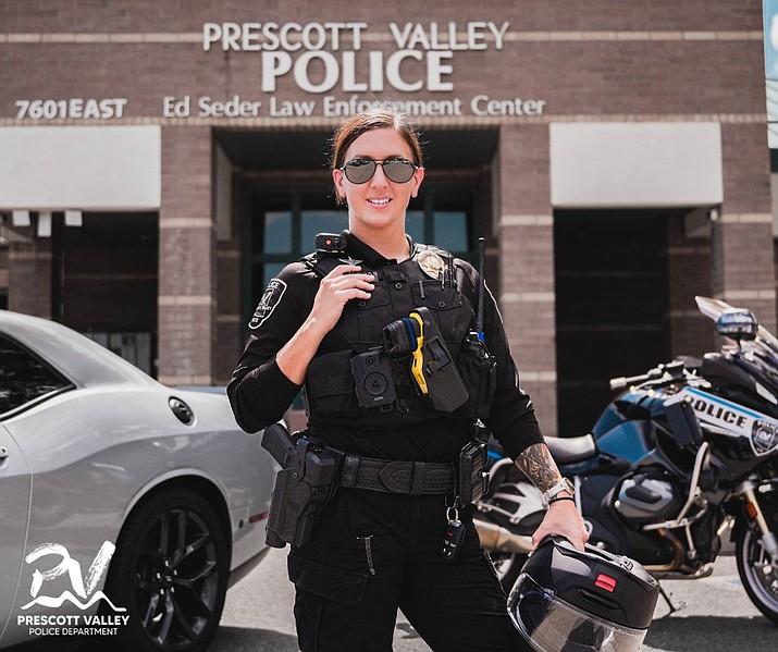 Prescott Valley Police Department motor officer Michelle Woods stands outside the police station. (PVPD/Courtesy)