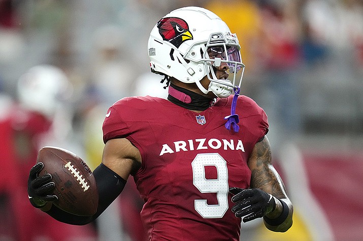 Arizona Cardinals safety Isaiah Simmons makes a catch as he warms up prior to an NFL preseason football game against the Kansas City Chiefs, Aug. 19, 2023, in Glendale, Ariz. Simmons was traded to New York on Aug. 24 by the Arizona Cardinals. Coming off a 40-0 loss to Dallas, the Giants travel to Arizona to play the Cardinals, Sunday, Sept. 17. (Ross D. Franklin, AP File)