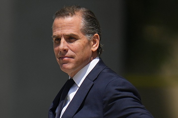 President Joe Biden's son Hunter Biden leaves after a court appearance, Wednesday, July 26, 2023, in Wilmington, Del. Hunter Biden has been charged with felony gun possession. A federal indictment filed in Delaware says Biden lied about his drug use when he bought a firearm in 2018 while struggling with addiction to crack cocaine. (Julio Cortez/AP, File)