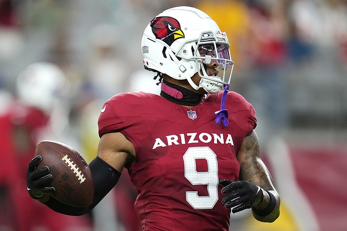 Arizona Cardinals safety Isaiah Simmons makes a catch as he warms up prior to an NFL preseason football game against the Kansas City Chiefs, Aug. 19, 2023, in Glendale, Ariz. Simmons was traded to New York on Aug. 24 by the Arizona Cardinals. Coming off a 40-0 loss to Dallas, the Giants travel to Arizona to play the Cardinals, Sunday, Sept. 17. (Ross D. Franklin/AP, File)