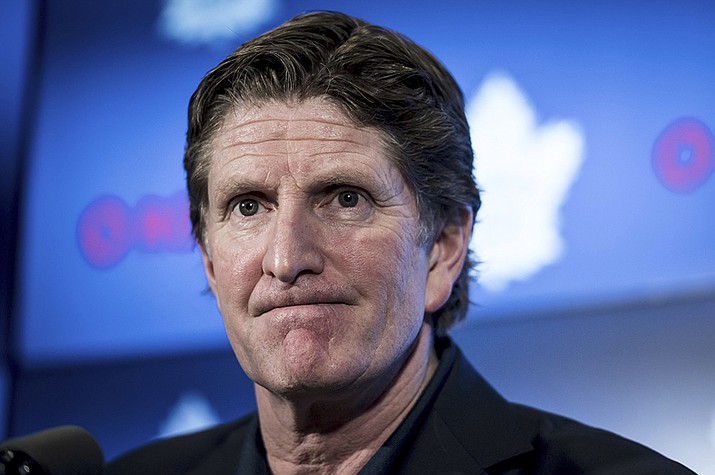 Then-Toronto Maple Leafs coach Mike Babcock speaks to reporters, April 25, 2019, in Toronto. Babcock resigned as coach of the Columbus Blue Jackets on Sunday, Sept. 17, 2023, after word emerged earlier this week of him asking players to show him photos on their phones. (Christopher Katsarov/The Canadian Press via AP, File)