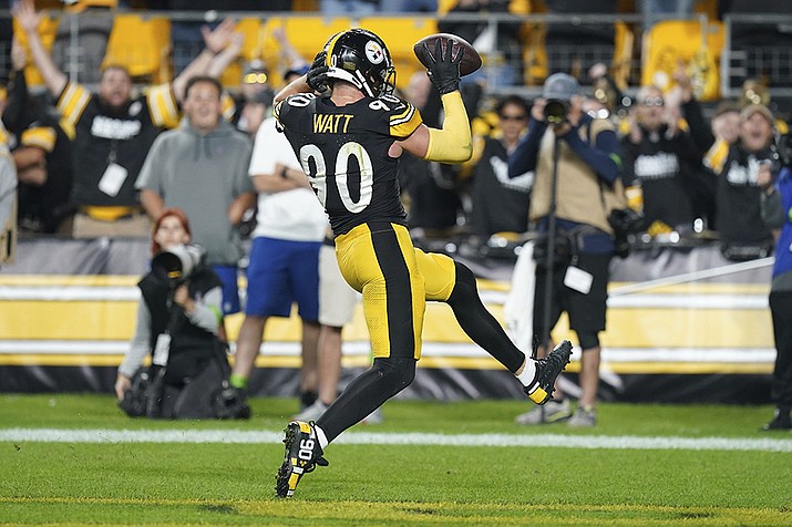 Pittsburgh Steelers linebacker T.J. Watt celebrates in the end zone after recovering a fumble by Cleveland Browns quarterback Deshaun Watson and returning it for a touchdown during the second half of an NFL football game Monday, Sept. 18, 2023, in Pittsburgh. (Matt Freed/AP)