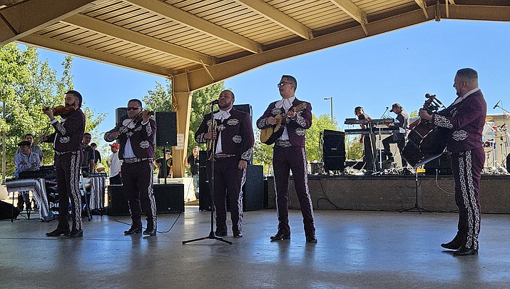 On Sunday, Sept. 24, 2023, the Town of Prescott Valley held its annual Puente de la Comunidad event, in their ongoing effort to build a bridge with the Hispanic community. Pictured are members of the band, Mariachi Chapala, performing under the large ramada. (Debra Winters/Courier)