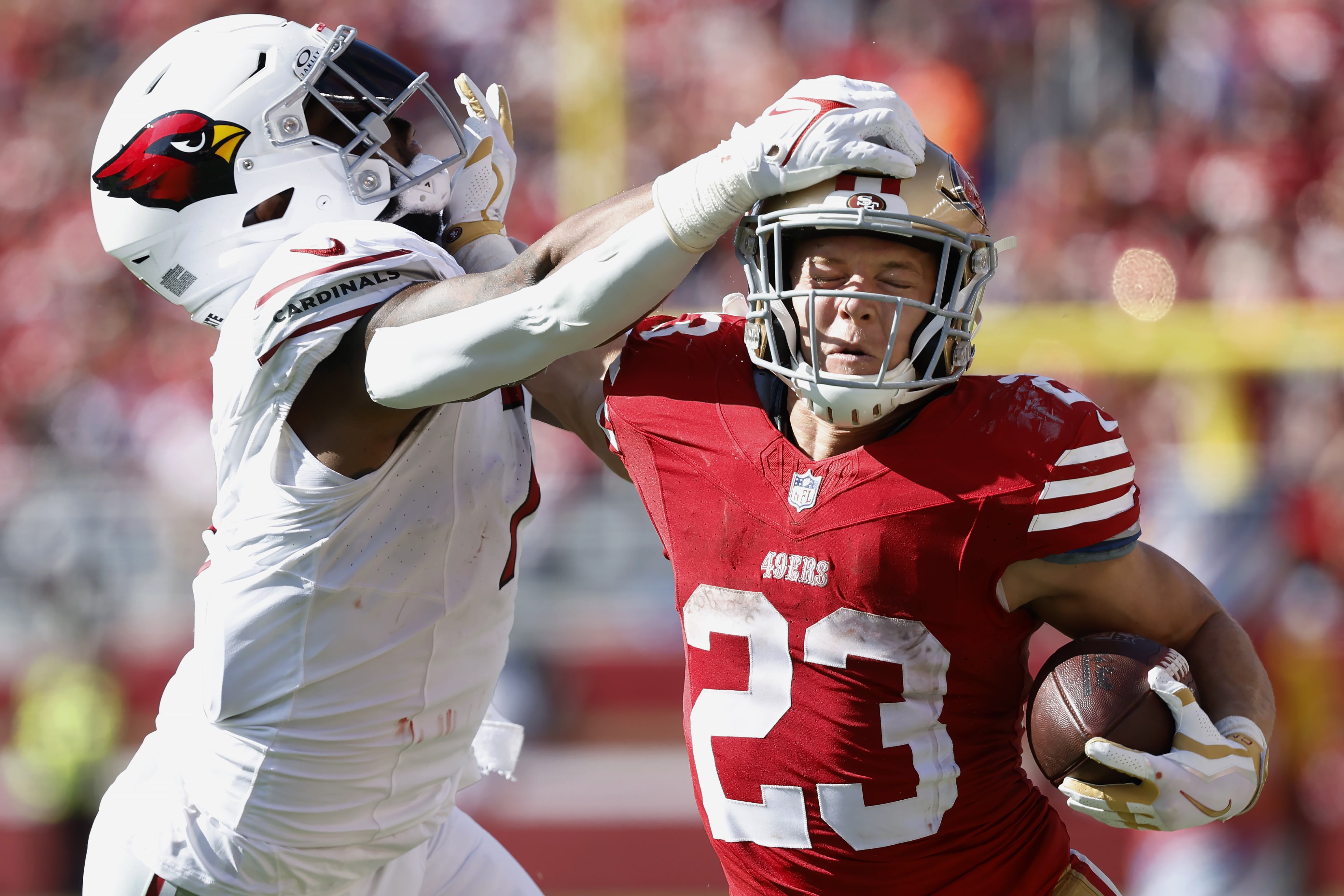 McCaffrey scores 4 touchdowns, leads 49ers past Cardinals 35-16