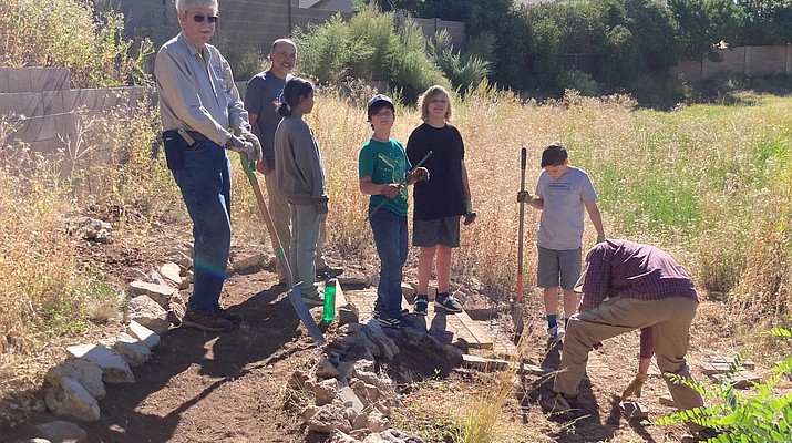 Granville Elementary students experience joy of restoring habitat on school property