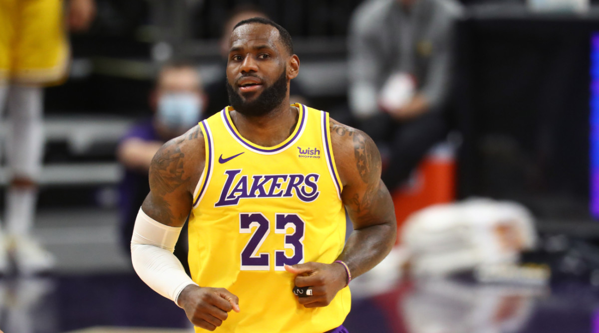 LeBron James turns up to Lakers' opener against the Nuggets in