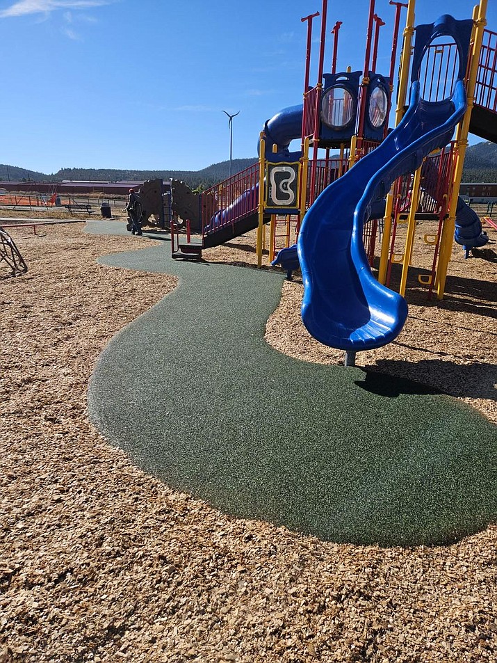 The Williams Elementary-Middle School playground recently received some safety upgrades that include shade structures, new wood chips and fall protection enhancements. (Photos/WUSD)