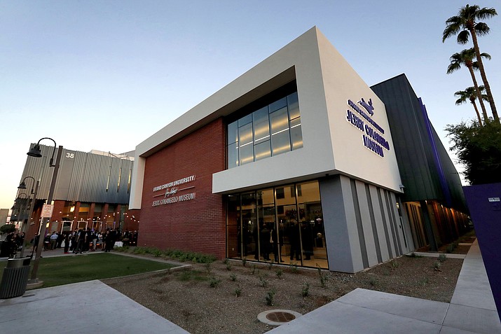 The Jerry Colangelo Museum at Grand Canyon University is seen at at dusk in Phoenix, on Sept. 20, 2017. Grand Canyon University, the country's largest Christian university, is being fined $37.7 million by the federal government amid accusations that it misled students about the cost of its graduate programs. (Matt York/AP-File)