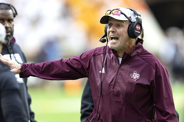 Texas A&M head coach Jimbo Fisher yells at his players during the second half of an NCAA college football game against Tennessee, Saturday, Oct. 14, 2023, in Knoxville, Tenn. (Wade Payne/AP)
