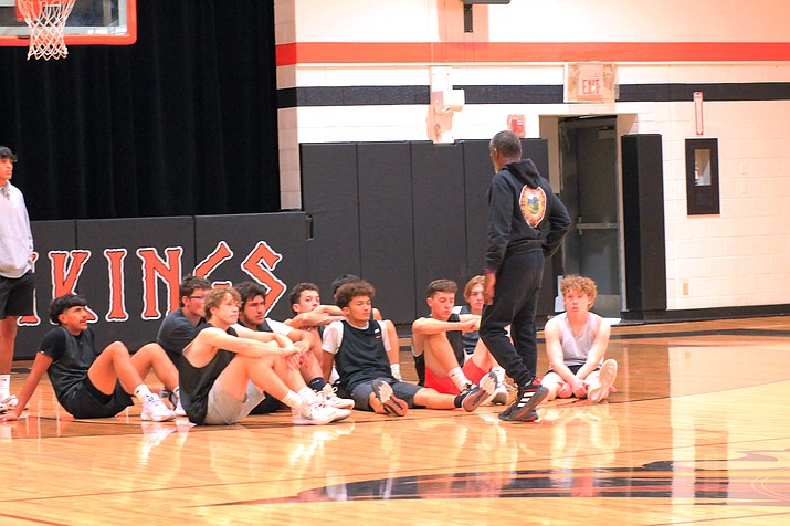 New basketball coach Michael Tyler speaks to players at the beginning of practice. (Morgan Smith/WGCN)