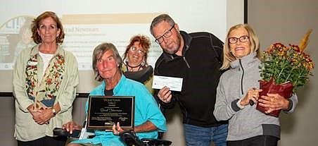 Gibert Olwine, Candice Lea, Brad Newman, Bill Loughney, executive director from YEI, accepting a check from Brad, and Mary Lemionet, Brad's sister. (Senior Referral Network/Courtesy)