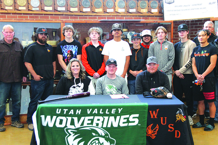 Tyler Jensen signs to play baseball with Utah Valley University. Jensen was joined by his parents, coaches and teammates at Williams High School. (Morgan Smith/WGCN)