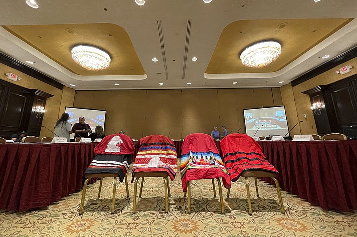 Members of the U.S. government’s Not Invisible Commission prepare for a field hearing in Albuquerque, N.M. June 28, 2023. (AP Photo/Susan Montoya Bryan)