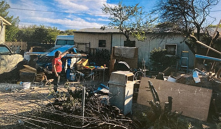 The Verde Lakes property has suffered a couple fires, causing the Town of Camp Verde to deem the house uninhabitable. The owner disagrees. (Courtesy photos)