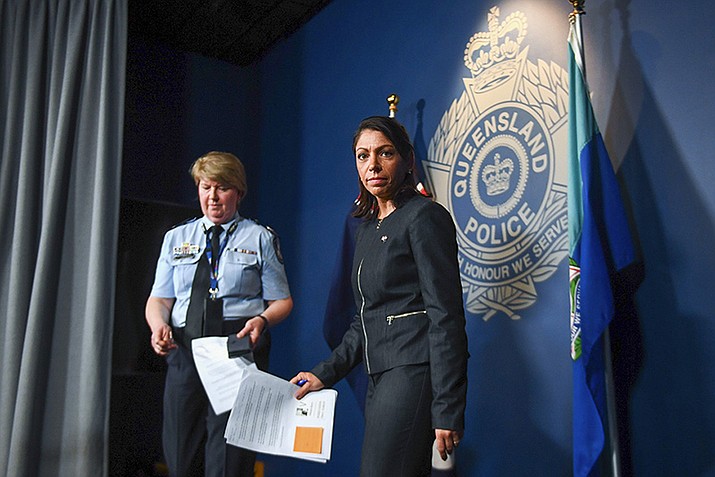 Queensland Police Service Assistant Commissioner Cheryl Scanlon and Federal Bureau of Investigation representative Nitiana Mann, right, leave after speaking to the media during a press conference at Queensland Police Service Headquarters in Brisbane, Australia, Wednesday, Dec. 6, 2023. A U.S. citizen has been charged in Arizona over online comments that allegedly incited what police describe as a "religiously motivated terrorist attack" in Australia a year ago in which six people died, officials said Wednesday. (Jono Searle/AAP Image via AP)