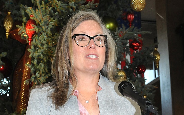 Gov. Katie Hobbs, shown at the annual state Christmas tree lighting in Phoenix, is agreeable to deploying National Guard troops at the border, but wants the federal government to pay for it. (Howard Fischer/For the Courier)