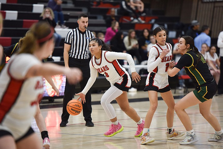 Giselle Serrano dribbles the ball as Kenna Martinez set a pick during Bradshaw Mountain High School’s win against Mohave High on Dec. 15, 2023 (Matt Wilson/For the Courier)