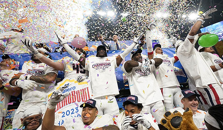 Arizona players celebrate their win over Oklahoma in the Alamo Bowl NCAA college football game in San Antonio, Thursday, Dec. 28, 2023. (AP Photo/Eric Gay)