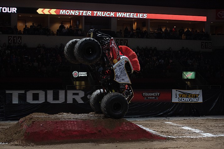 The gladiator-themed monster truck known as Maximus pops a nose wheelie during the Friday, Jan. 5, 2024, during The A&W Toughest Monster Truck Tour stop at the Findlay Toyota Center in Prescott Valley. Visit dCourier.com for more photos from this weekend’s event. (Matt Wilson/For the Courier)