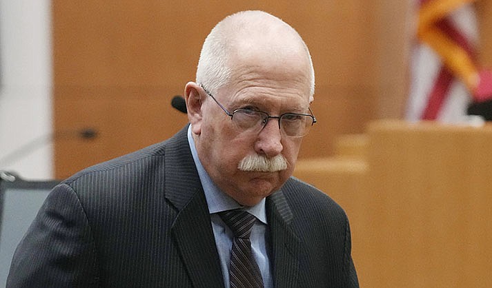 Retired Arizona Corrections Director Charles Ryan pauses in the courtroom after pleading no contest to a disorderly conduct charge in a plea agreement at Maricopa County Superior Court, Nov. 14, 2023, in Phoenix. Ryan is scheduled to be sentenced Thursday, Jan. 11, 2024, for the plea, which stems from an encounter in which police say he fired a gun inside his Tempe, Ariz., home in early 2022 and pointed a firearm at two officers during a three-hour standoff. (AP Photo/Ross D. Franklin, Pool, File)