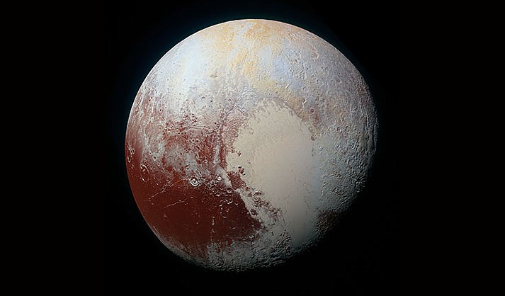 Color-enhanced photo of Pluto (NASA)