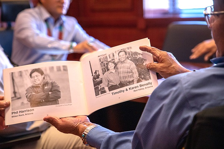 Navajo Uranium Radiation Victims Committee displays a book of victims impacted by radiation exposure at the Office of the President and Vice President in January 2023. (Photo/OPVP)