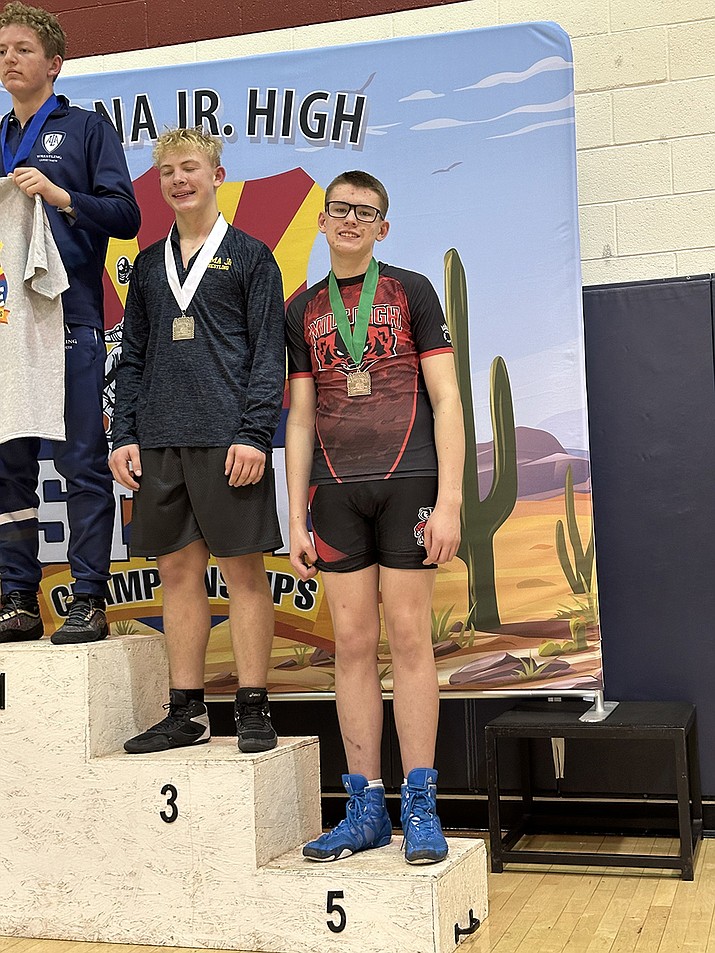 Eighth-grader Dexter Hewitt, wrestler from Prescott Mile High Middle School, proudly celebrates his fifth-place victory at the AZ State Wrestling Championships. (Courtesy)