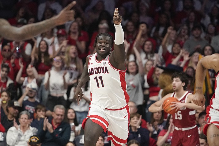 Arizona's Oumar Ballo (11) gestures after scoring against Stanford during the first half of an NCAA college basketball game Sunday, Feb. 4, 2024, in Tucson, Ariz. (Darryl Webb/AP)