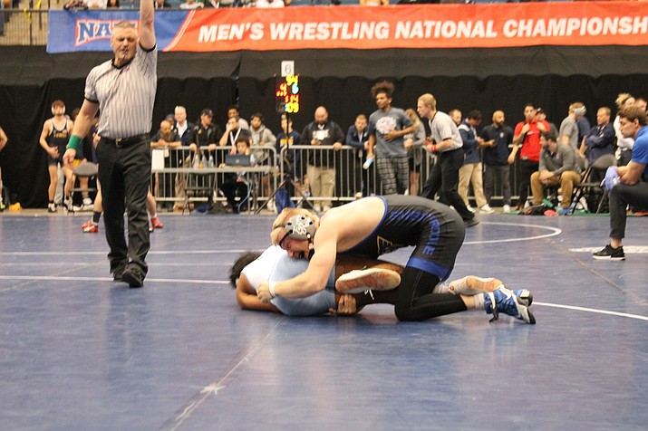 Embry-Riddle’s Keller Rock (top) wrestles for position during a match (Courtesy Photo)