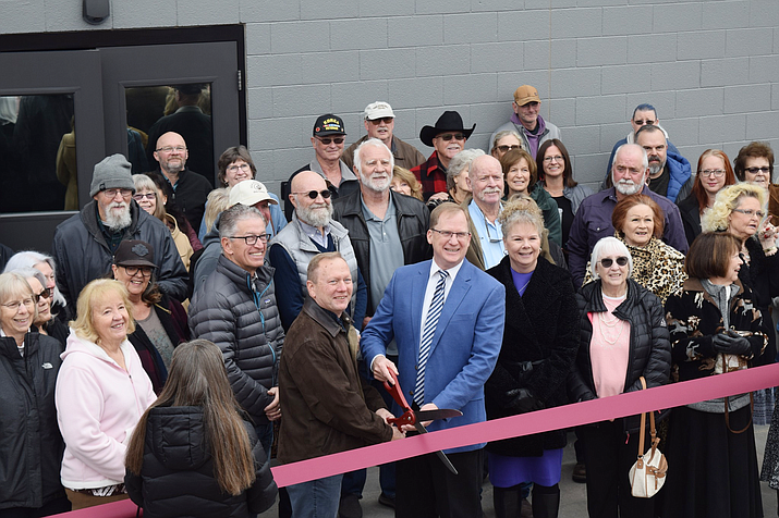 Pastor Wayne Ballard cuts the ribbon on the new Grace Church building in Chino Valley Sunday Feb. 4, 2023. (Stan Bindell/For the Review)