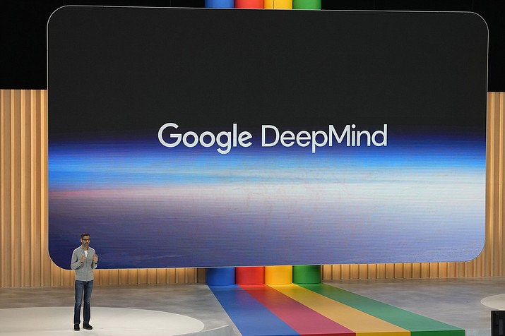 Alphabet CEO Sundar Pichai speaks about Google DeepMind at a Google I/O event in Mountain View, Calif., Wednesday, May 10, 2023. Google on Thursday, Feb. 7, 2024, introduced a free artificial intelligence app that will implant the technology on smartphones to enable people to quickly connect to a digital brain that can write for them, interpret what they're reading and seeing in addition to helping manage their lives. (Jeff Chiu/AP-File)